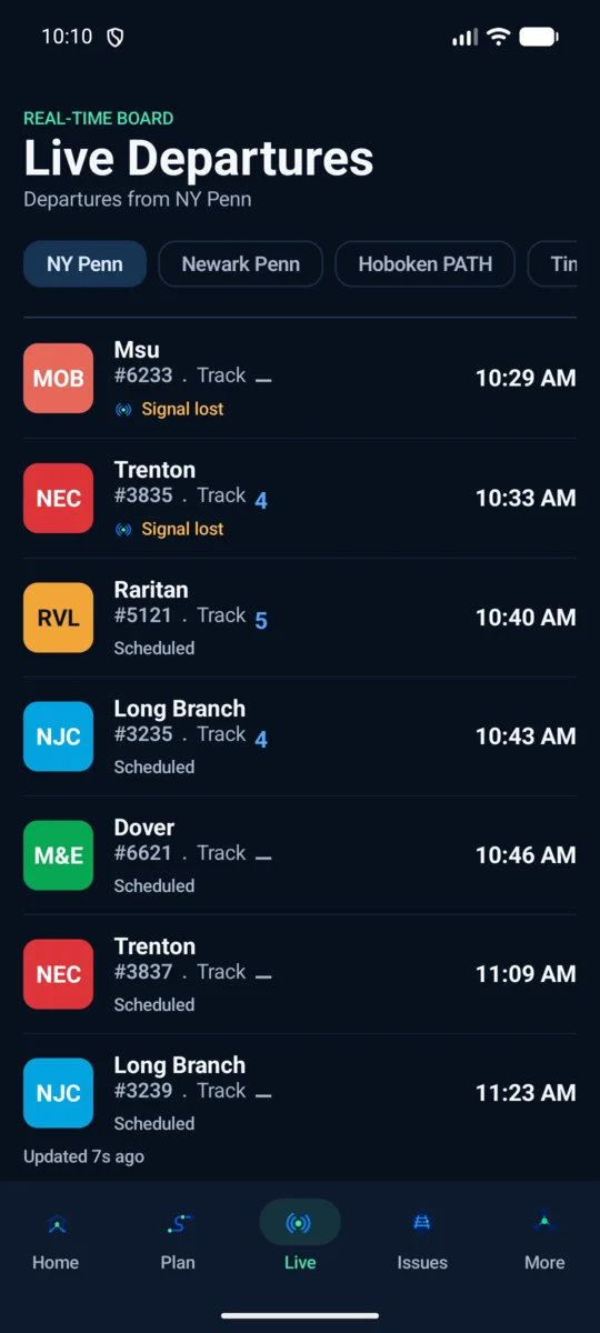 Actual New York Penn NJ TRANSIT board showing available tracks, train numbers, Scheduled and Signal lost labels.